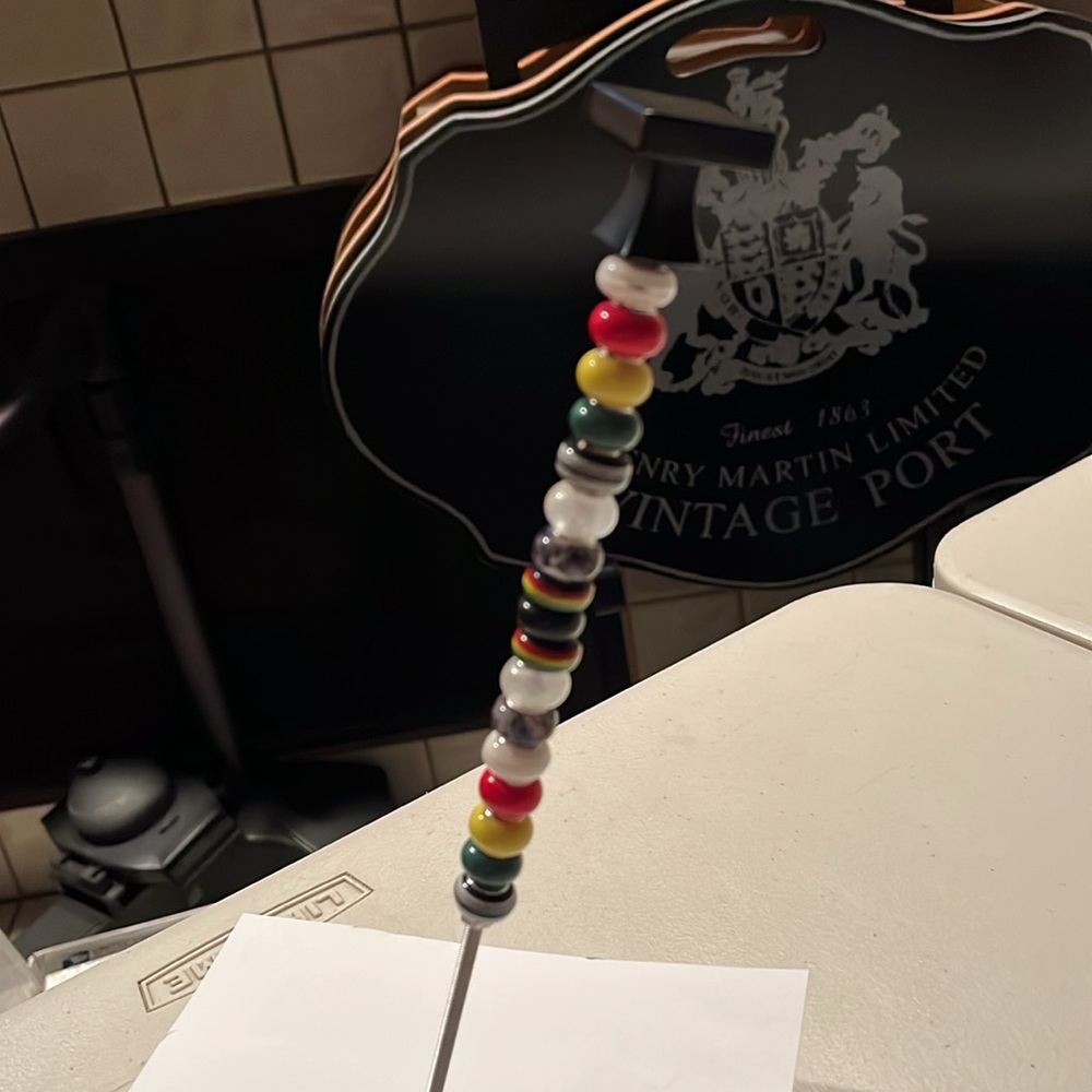 Colorful Beaded planter stick decor